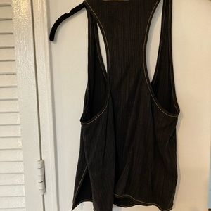 Low scoop neck, black racerback tank with brown stitching